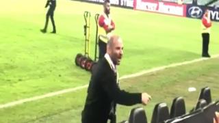 A still image from a video showing Australian celebrity chef George Calombaris pointing his finger at football fans in Sydney