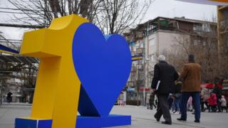 A statute of the number 10, with a heart shape taking the space of 0 in the number, to celebrate Kosovo's 10th birthday.
