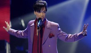 Prince performs in a surprise appearance on American Idol