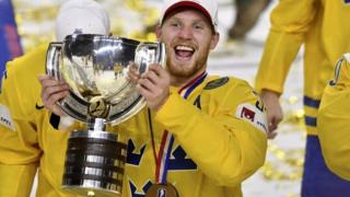 Swedish players celebrate after taking gold