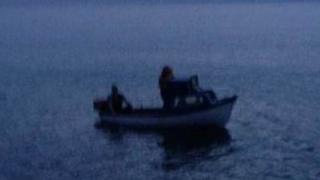 Couple stranded on dinghy