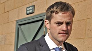 Henry Hendron outside a court after a case