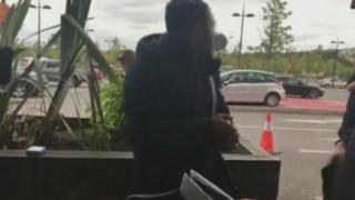 The suspect during the confrontation