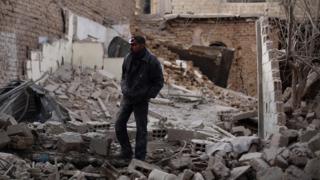 The outskirts of Damascus in the aftermath of a Syrian government airstrike