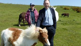Father Edward Owen meets Barney the Shetland pony