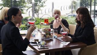 Women at a Maiden Voyage afternoon tea