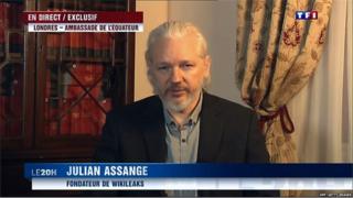 An image grab taken from French TV channel TF1 shows WikiLeaks founder Julian Assange speaking from the embassy of Ecuador in London during a televised interview with TF1 in Boulogne-Billancourt, a suburb of Paris, on June 24, 2015.