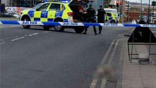Blurred pic of dog on street and police
