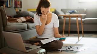 Woman checking budget