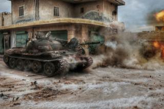 Members of a Syrian opposition group attack the headquarters of Assad regime forces in the villages of Nubul and al-Zahraa in Aleppo, Syria on 12 February 12 2016.
