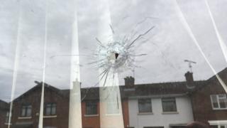 Bullet hole in window of house in Rossdowney Drive, Londonderry