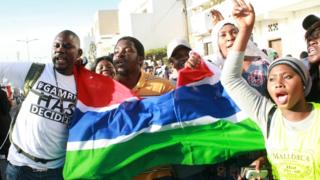 Supporters of elected Gambian President Adama Barrow have taken to the streets of neighbouring Senegal