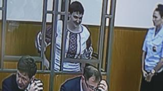 A monitor at a court's press room shows Ukrainian air force helicopter pilot Nadia Savchenko (22 September 2015)