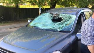 the damaged car