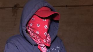 Young woman wearing disguise