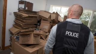 Boxes which held drugs stacked up