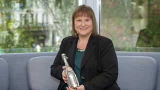 Alison Brittain holding her Veuve Clicquot award