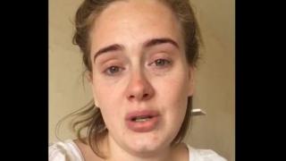 A still of Adele in the video posted on social media
