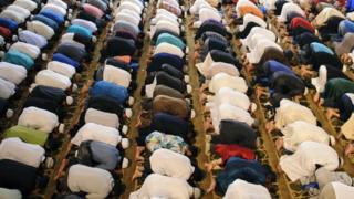 Muslims praying in London