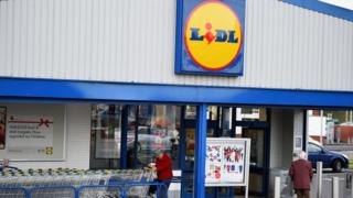 Shoppers outside a Lidl store