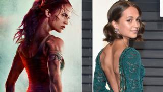 Alicia Vikander on the Tomb Raider poster and in the flesh