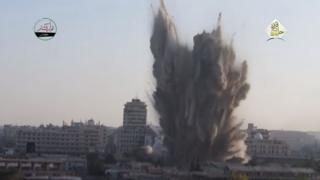 Dust, smoke and debris exploding into the air from an explosion, in a video posted to YouTube in July 2016