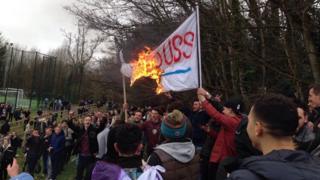 Students burning a flag
