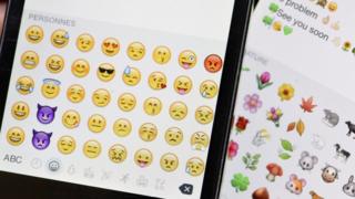 Emoji icons on smartphone screen