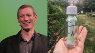 Craig Sullivan and holding bottle