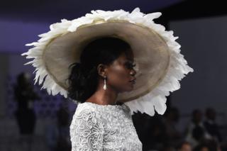 A model presents a creation by designer Yemi Shoyemi during the Lagos Bridal Fashion Week in Lagos on May 4, 2018