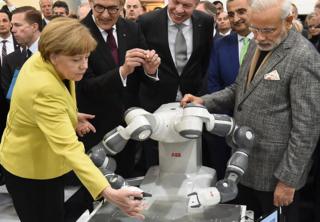 world leaders play with robots