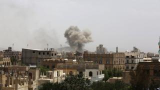 Smoke rises after an airstrike by the Saudi-led coalition in Sanaa, Yemen, on 14 July, 2015