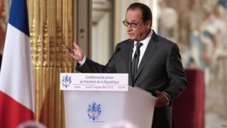 French President Francois Hollande delivers a speech during his bi-annual press conference at the Elysee presidential palace in Paris