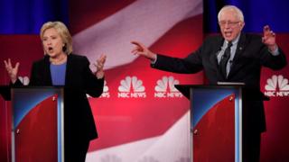Democratic U.S. presidential candidate and former Secretary of State Hillary Clinton and rival candidate U.S. Senator Bernie Sanders speak simultaneously at the NBC News - YouTube Democratic presidential candidates debate in Charleston, South Carolina January 17, 2016