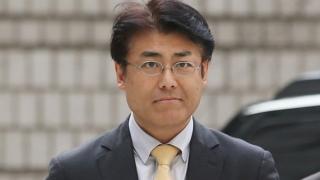 In this Oct. 19, 2015, photo, Tatsuya Kato, a former Seoul bureau chief of Japan's Sankei Shimbun, arrives at Seoul Central District Court in Seoul, South Korea.