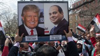 Supporters of Egyptian President Abdul Fattah al-Sisi chant slogans as he meets US President Donald Trump at the White House on 3 April 2017