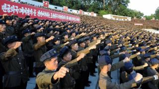 This picture taken on August 11, 2017 and released by North Korea"s official Korean Central News Agency (KCNA) on August 12, 2017 shows North Korean youths and workers and trade union members holding a rally to protest the UN Security Council"s "sanctions resolution" at the Youth Park Open-Air theatre in Pyongyang.