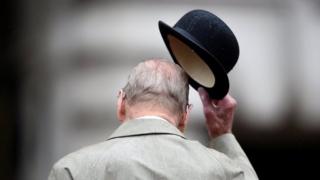Prince Philip doffs his bowler hat