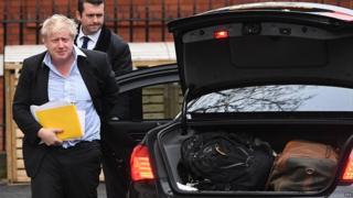 Boris Johnson arriving back at his London residence after a trip to south-east Asia