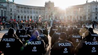 Police and protesters outside the Hofburg Palace, 18 Dec 17