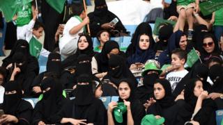 Saudi women sit in a stadium to attend an event in the capital Riyadh on 23 September