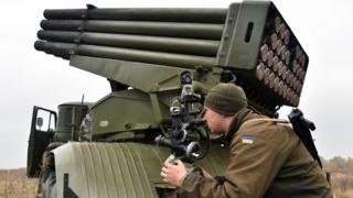 Ukrainian soldier aiming Grad rocket system on exercises, 28 Oct 16