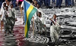 Gold Coast 2018 Commonwealth Games - Opening ceremony - Carrara Stadium - Gold Coast, Australia - April 4, 2018 - Salome Nyirarukundo of Rwanda carries the national flag during the opening ceremony