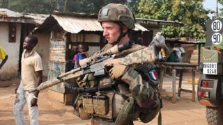 A French soldier of the the 'Sangaris Operation' standing guard