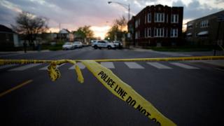 Chicago Police crime tape is displayed at the scene.