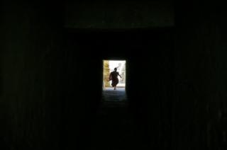 A young monk runs during a break from his studies inside Thiksey Monastery in Ladakh, India.