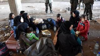Syrian families gather in the government-held Jibreen district of Aleppo, after fleeing the rebel-held east of the city. Photo: 27 November 2016