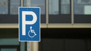 A disability parking sign