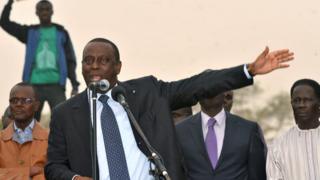 Former Senegalese foreign minister, Cheikh Gadio (centre)