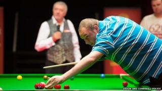 Stuart Craig with snooker cue. Pic: Devon and Cornwall Police